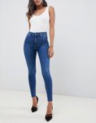 Asos Design Ridley High Waisted Skinny Jeans In Dark Stone Wash With Raw Hem Detail-blue