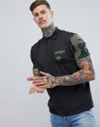 Asos Design Relaxed Polo With Camo Sleeve And Pocket - Black