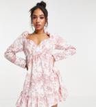 Missguided Petite Mini Wrap Dress With Frill Hem In Pink Print