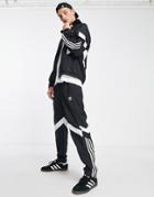 Adidas Originals Rikeve Cut 3-stripes Track Pants In Black