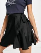 Lola May Wrap Satin Mini Skirt In Black