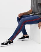 New Look Skinny Jeans With Red Side Stripe In Blue Wash - Blue