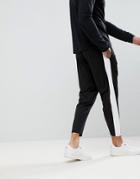 Asos Tapered Retro Track Joggers With Contrast Side Stripe In Black - Black