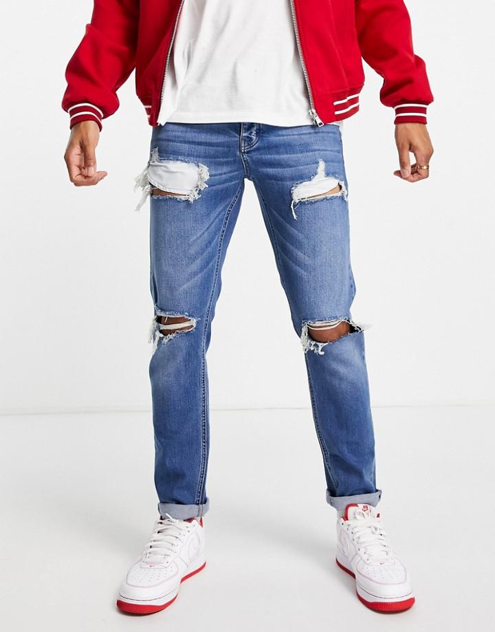 Asos Design Stretch Slim Jeans In Dark Wash Blue With Heavy Rips-blues