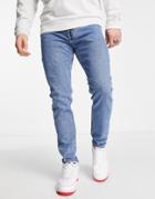 Levi's 512 Slim Taper Lo Ball Jeans In Blue With Knee Abraison