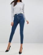 Asos Design Ridley High Waist Skinny Jeans In Mid Blue Wash
