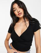 Asos Design Wrap Top With Cap Sleeve In Rib In Black