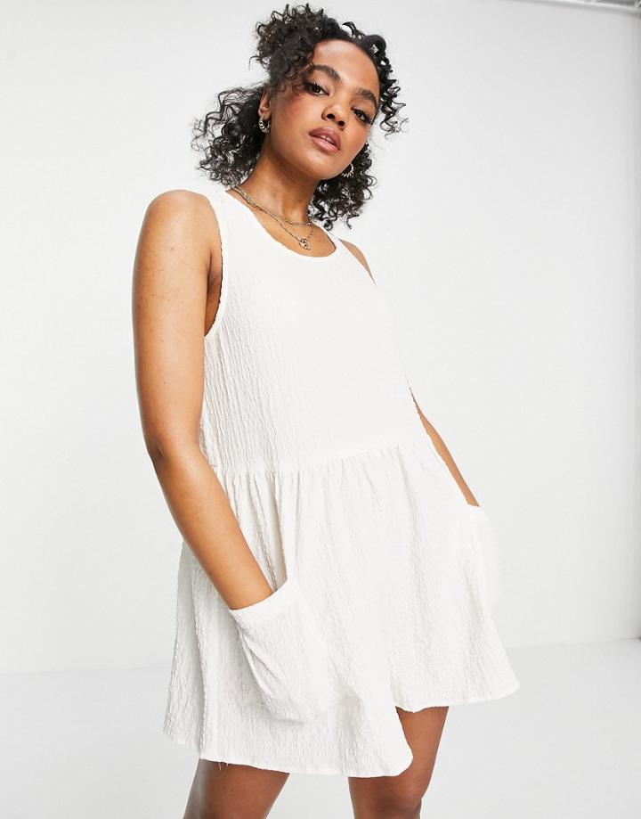 Asos Design Smock Sleeveless Textured Romper With Pockets In Cream-white