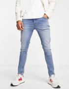 Asos Design Cotton Blend Skinny Jeans In Tinted Light Wash - Lblue-blues