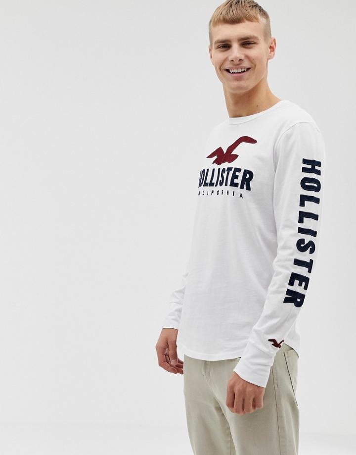 Hollister Chest And Sleeve Logo Long Sleeve Top In White - White