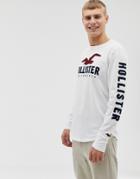 Hollister Chest And Sleeve Logo Long Sleeve Top In White - White