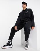 Asos Design Set Tapered Sweatpants In Black With Pintucks And Text Print