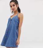 Asos Design Petite Denim Halter Neck Mini Dress With Buttons In Midwash Blue