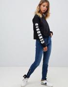 Asos Ridley High Waist Skinny Jeans With Lace Up Hem In Nancy Dark London Blue