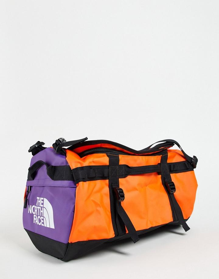 The North Face Base Camp Small 50l Duffel Bag In Orange/blue-red