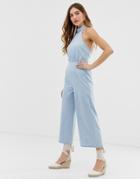 Asos Design Denim Halterneck Jumpsuit With Wide Leg In Lightwash Blue