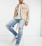 Asos Design Skinny Jeans In Vintage Light Wash Blue With Knee Rips-blues
