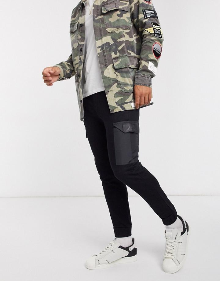 The Couture Club Contrast Pocket Tapered Cargo Sweatpants In Black