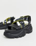 Buffalo London Bo Chunky Flatform Logo Sandals In Black