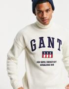 Gant Front Shield Logo Wool Knit Turtleneck Sweater In Cream-white