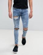 Yourturn Tapered Jeans With Distressing - Blue