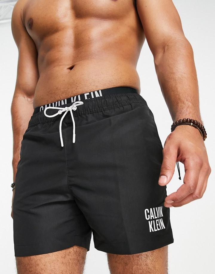 Calvin Klein Small Thigh Logo Swim Shorts In Black