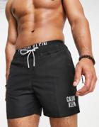 Calvin Klein Small Thigh Logo Swim Shorts In Black