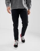 Asos Design Tapered Jeans With All Over Print In Black - Black