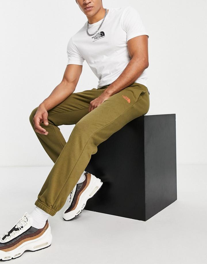 The North Face Leg Graphic Sweatpants In Khaki-green