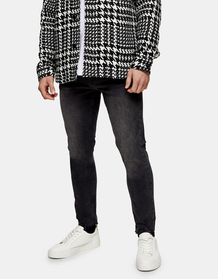 Topman Organic Cotton Blend Raw Hem Stretch Skinny Jeans In Washed Black-grey