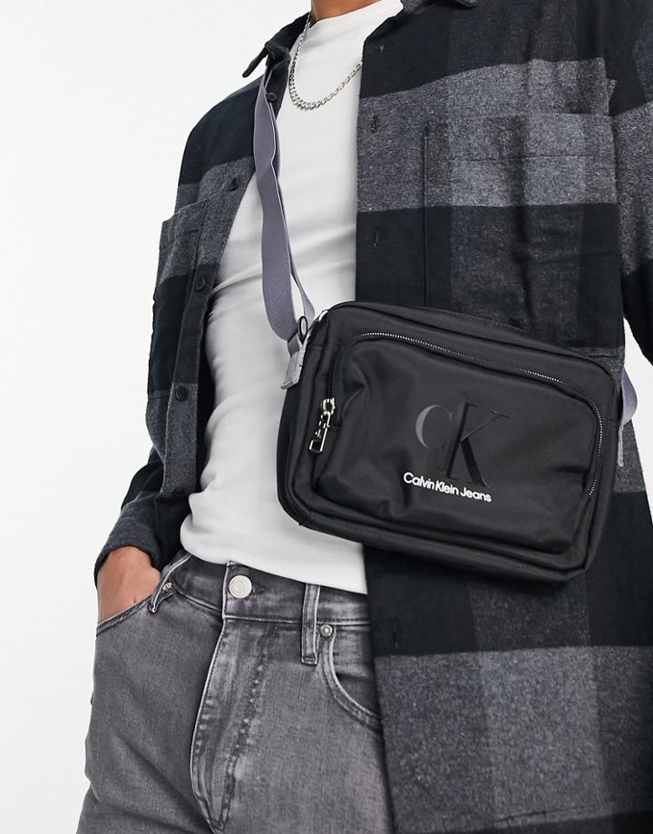 Calvin Klein Jeans Monogram Cross Body Bag In Black
