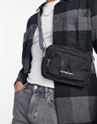 Calvin Klein Jeans Monogram Cross Body Bag In Black