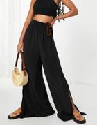 Mango Elastic Pants With Side Slit In Black