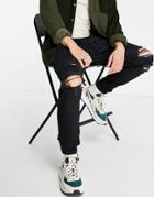 Bershka Tapered Jeans In Washed Black