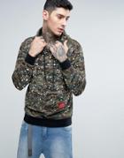 Reason Camo Hoodie With Paint Splat And Back Print - Green