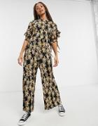 Asos Design Frill Back And Sleeve Plisse Tea Jumpsuit In Mustard Floral-multi
