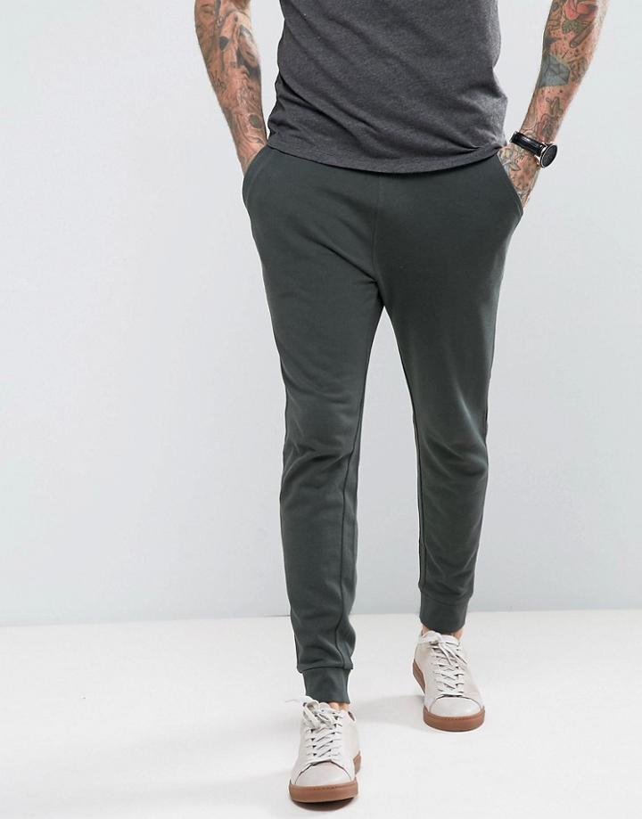 Asos Super Skinny Joggers In Dark Green - Green