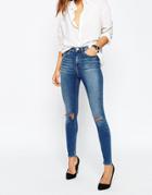 Asos Ridley High Waist Skinny Jeans In Darmera Mid Stonewash With Busted Knees - Darmera Mid Blue