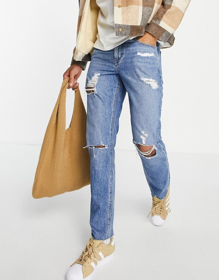 Asos Design Slim Jeans In Mid Wash Blue With Heavy Rips And Raw Hem-blues