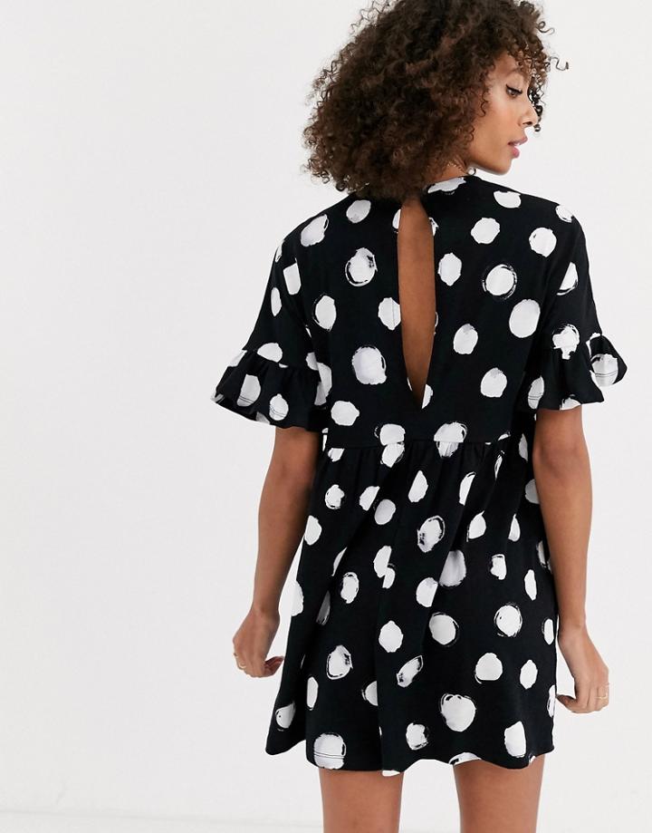 Asos Design Smock Romper With Frill Sleeve In Mono Polka Dot