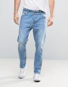 Asos Tapered Jeans With Raw Hem And Waistband In Light Blue - Blue