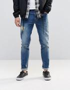 Asos Skinny Jeans With Front And Back Rips In Mid Blue - Blue