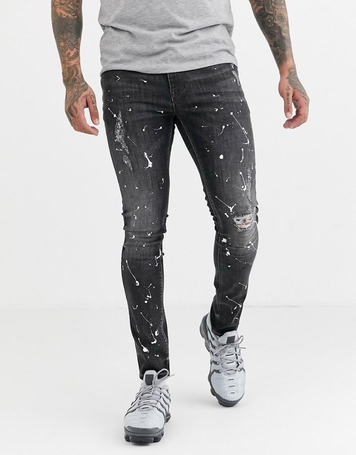 Asos Design Super Skinny Jeans In Washed Black With Paint Splatter