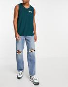 Asos Design Baggy Jeans In Mid Wash Blue With Busted Knees