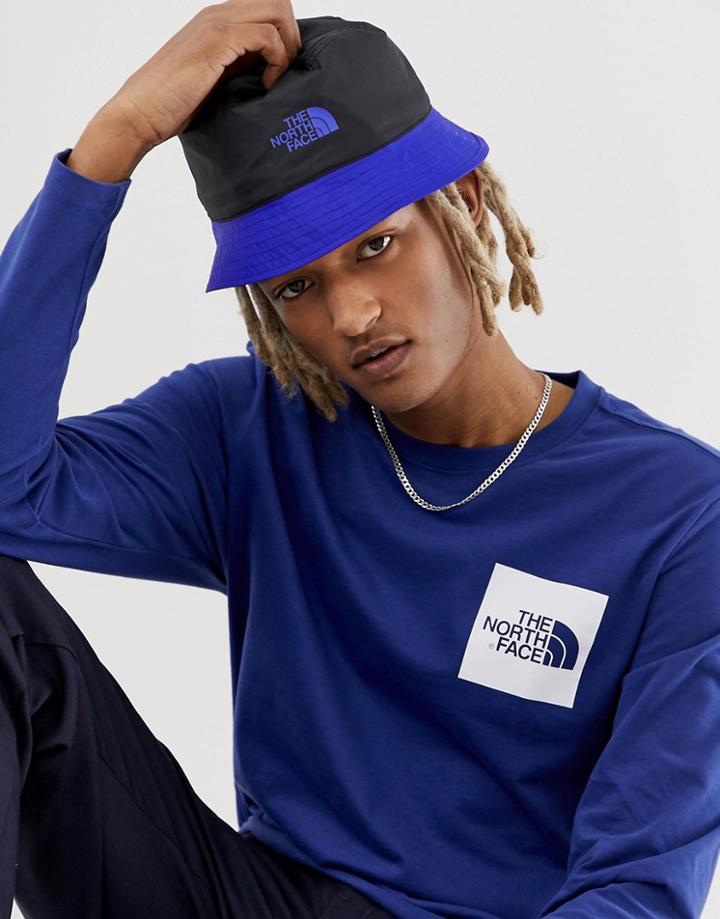 The North Face Rage Sun Stash Bucket Hat In Geo-tribal Blue - Blue