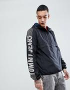 Tommy Jeans Capsule Overhead Hooded Jacket Sleeve Logo In Black - Black