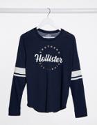 Hollister Front Logo Long Sleeve Tee In Navy