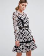True Decadence Lace Dress With Contrast Ladder Detail And Flippy Skirt - Black