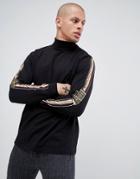 Asos Design Relaxed Long Sleeve T-shirt With Roman Numeral Sleeve Print And Roll Neck - Black