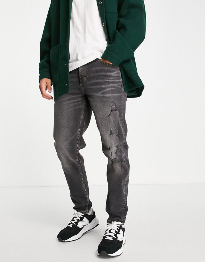 Asos Design Cotton Blend Tapered Jeans In Washed Black With Abrasions - Black
